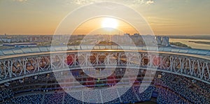 Stadium filled with people watching a game