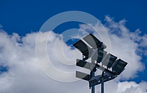 Stadium floodlights against the sky