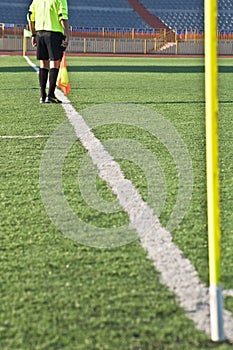 STADIUM - Football field with goal and tablo on blue sky