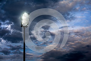 Stadium lights against dark night sky