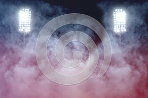 Stadium lights and smoke