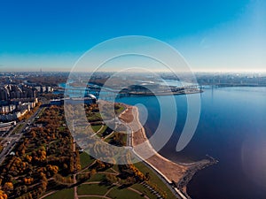 Stadium St. Petersburg. Zenit-Arena. Gulf of Finland. Clear autumn day. Blue sky. Pedestrian bridge. Highway. Top view.