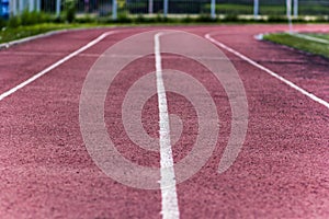 Stadium track and field area empty on a summer day