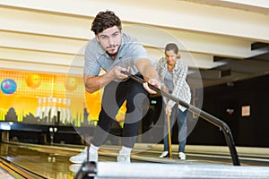 staff cleaning and preparing bowling alley