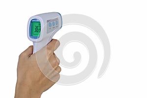 Staff hand hold non contact infrared thermometer on pure isolated white background with copy space. Concept of protect Covid flu.