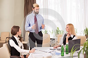 Staff meeting in business meeting room