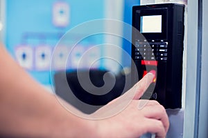 Staff push down electronic control machine with finger scan to access the door of control room or data center