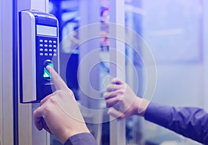 Staff push down electronic control machine with finger scan to access the door of control room or data center. The concept of data