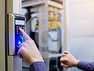 Staff push down electronic control machine with finger scan to access the door of control room or data center. The concept of data