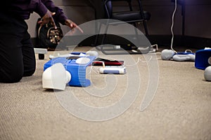 Staff putting medical gloves for first aid training