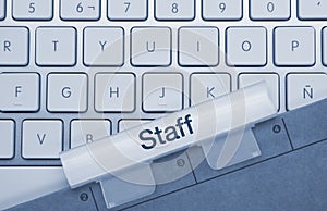 Staff - Inscription on Blue Keyboard Key photo