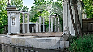 Stage with columns, statues and a fountain in a summer theater