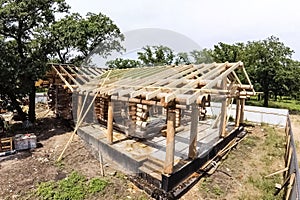 Stage of construction of a wooden house