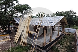 Stage of construction of a wooden house