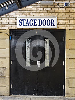 Stage Door sign and door