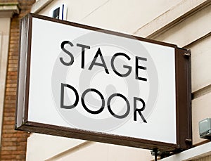 STAGE DOOR sign outside theatre.