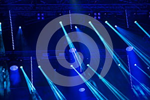 Stage lights and spotlights abstract blue bright background