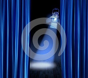 Stage spotlight blue curtains