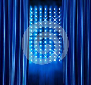 Stage spotlights blue curtains