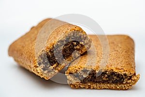 Staged fig bars on a white table