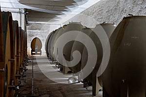 Stages of wine production from fermentation to bottling, visit to wine cellars in Burgundy, France. Aging in concrete eggs vats