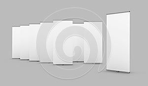 Staggered series of Exhibition Banner Stands, isolated on a grey.