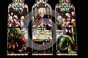 Stain glass windows of last supper photo