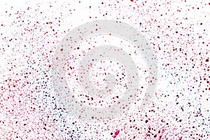 Splashes of paint of bright colors on a white background