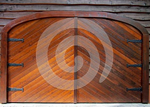 Stain wood barn doors with black hinges