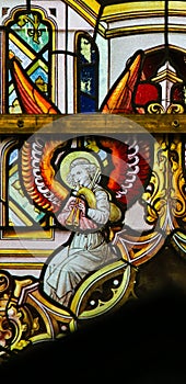 Stained Glass - Angel playing a bagpipe