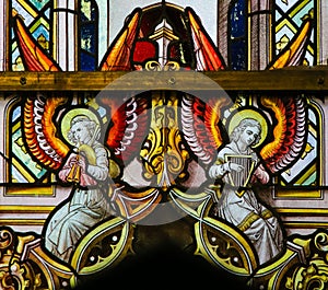 Stained Glass - Angels with bagpipe and harp photo