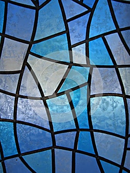 Stained glass background with ice flowers photo