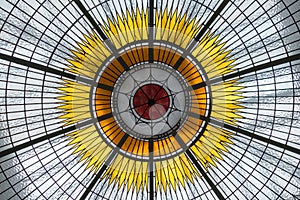 Stained glass ceiling with hub and spoke pattern