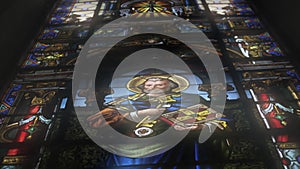 Stained Glass in church. Christianism, religion, holy father