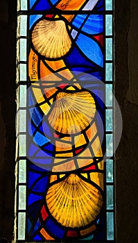 Stained glass detail. Interior of St Peter Ad Vincula Church. Wisborough Green, Sussex, UK