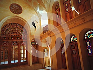 Stained glass doors, windows, rose inside Muslim palace