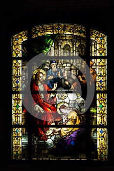 Stained glass with Jesus Christ in a Catholic church