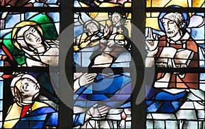 Stained Glass - Jesus Christ at the Deathbed of Mother Mary photo