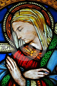 Stained glass with madonna image photo