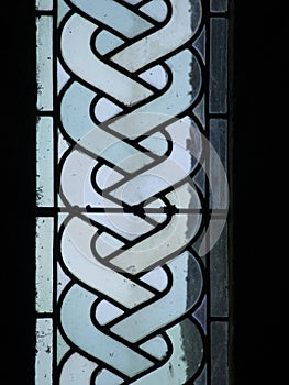 Stained glass at the Mont Saint Michel Abbey, France photo