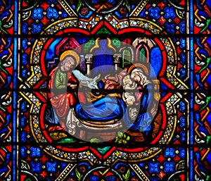 Stained Glass in Notre Dame, Parisof a Nativity Scene at Christmas