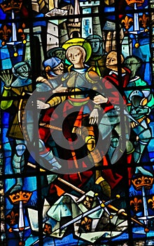 Stained Glass in Rouen Cathedral - Joan of Arc photo