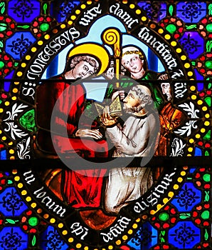 Stained Glass - Saint Conteste consecrated as bishop of Bayeux i photo