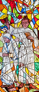 Stained glass showing the missionaries photo