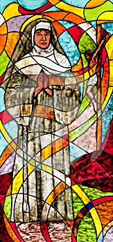 Stained glass showing the nun