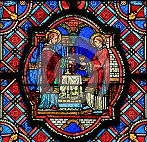 Stained Glass in Tours Cathedral - Eucharist photo