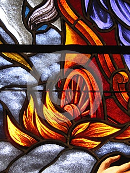 Stained glass window Ezekiel`s fiery chariot wheel