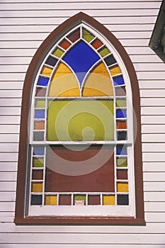 A stained glass window in a New England Church