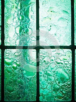 Stained glass window with regular block pattern