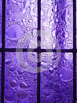 Stained glass window with regular block pattern